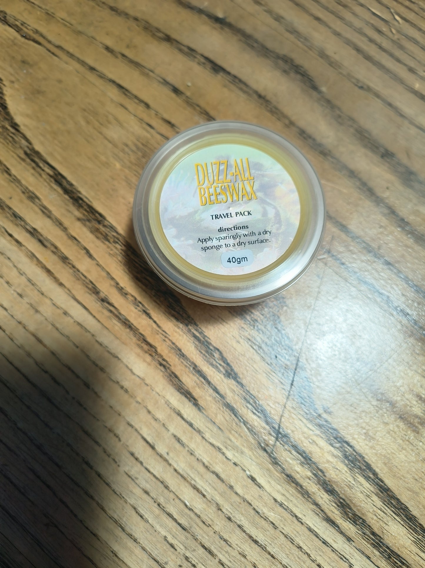 Assorted leather and napa accessories including boots and wallets. All-purpose cleaner for natural and synthetic materials